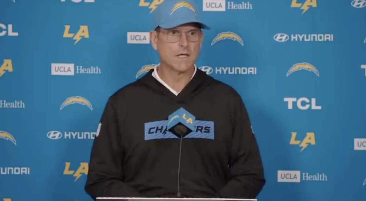 Jim Harbaugh compares himself to Moses at presser